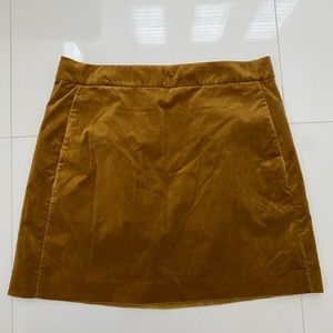 J. Crew Stretch Velvet Mini Skirt with Pockets in Mustard
